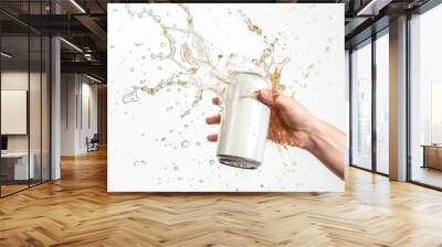 A human hand holding open white can with splashing out soda drink on white background. AI generated Wall mural