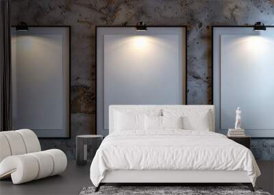 A trio of white frames with dark borders on a wall with a gypsum plaster texture in a modern architectural firm, each centrally spotlighted  Wall mural