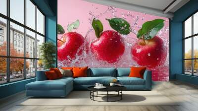 Juicy red apples with vibrant green leaves making a splash in water, creating a dynamic and refreshing scene on a pink background with generative ai Wall mural