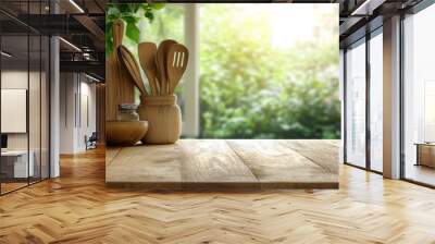 Kitchen wooden utensils and tool on wooden table top and blurred green garden outside the window background. with generative ai Wall mural