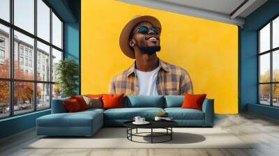 Smiling cool stylish gen z Black hipster guy looking away at copy space advertising promotion. Happy positive young adult African American man standing at yellow background. with generative ai Wall mural