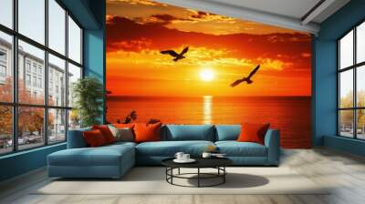 The setting sun shines on the sea, and two birds fly in front of it. The sky is a vibrant orange-red with many clouds floating above the water's surface. with generative ai Wall mural