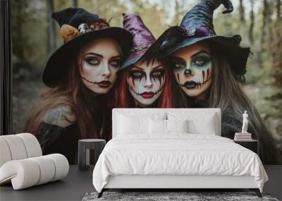 Three beautiful witch in halloween costumes with makeup on a background of the forest with generative ai Wall mural