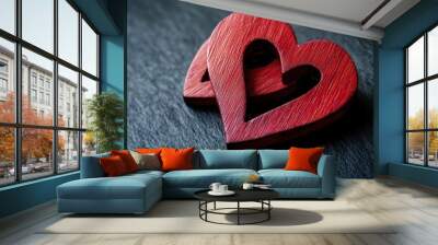 Two Red Wooden Interlocking Hearts On Black Felt Background - Valentine's Day / Marriage Concept with generative ai Wall mural