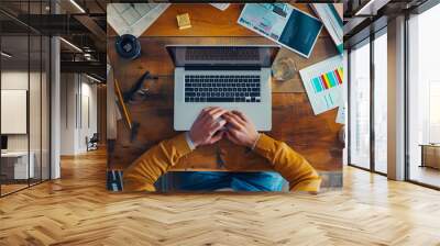 1 person typing their laptop office desk focused determined process of writing copy web marketing campaign individual wearing casual attire blue jean or sweater over top sitting comfortably against Wall mural