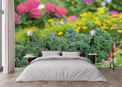 A bountiful vegetable garden showcasing rows of kale, turnips, and radishes, surrounded by colorful blooming flowers. Wall mural