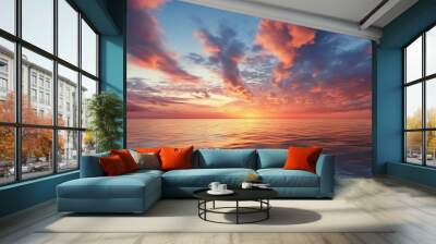 a magnificent sky with clouds over the sea in the evening. stunning sunset above the ocean. Wall mural