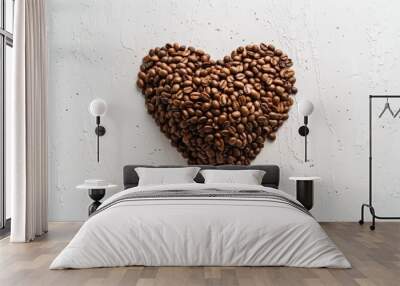 A minimalist design of a heart shape made with coffee beans, elegantly isolated on a white surface, presented in a top-down, flat lay composition. Wall mural