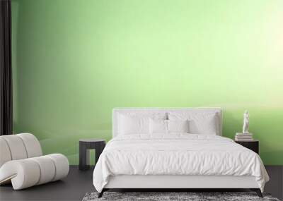 A serene light green gradient background with a subtle hint of texture, offering a tranquil backdrop for showcasing various products. Wall mural