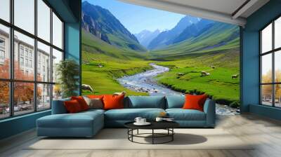 A trough valley with grazing sheep and a meandering river under a clear sky Wall mural