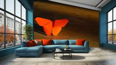 butterfly origami on wooden background for cover and copy space with sunset light effect and shadow Wall mural