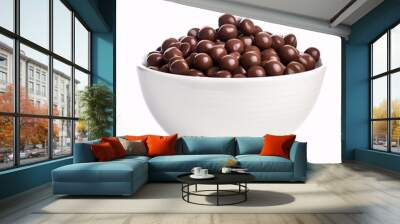 Chocolate cereal balls in a bowl isolated on white background. Wall mural