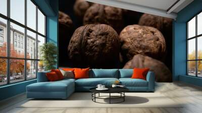 close-up of walnuts isolated on black background Wall mural