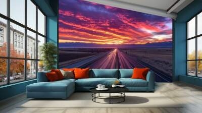 Empty asphalt road in rural landscape in the rays of the sunset with dark storm cloud Wall mural