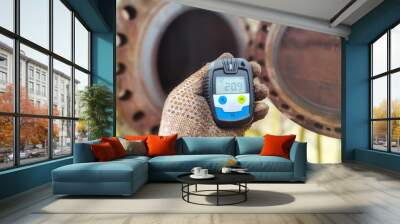 Selective focus is a portable gas detector, a tool for detecting sufficient oxygen in confined spaces. Wall mural