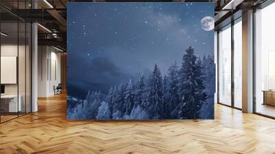 Winter night with full moon and starry sky. Frost covered trees in a mountain forest. Landscape with fresh snow Wall mural