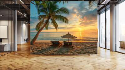 Tropical beach with two sunbeds and umbrella under a palm tree on a summer vacation, golden hour light, travel background for a poster or banner design Wall mural