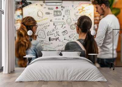 A group of young professionals brainstorm ideas in a creative meeting Wall mural