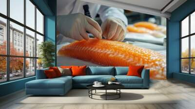 Chef preparing fresh salmon for a gourmet meal. Wall mural