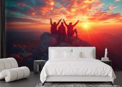 Group friends mountain climbers ascending steep cliffs or ridges with a sunset view
 Wall mural