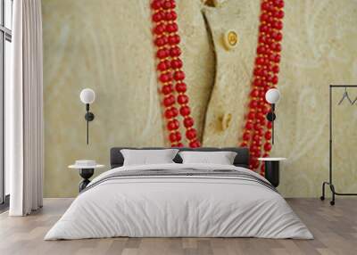 rings on a Off White sherwani dress Wall mural