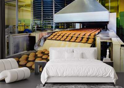 Production line of baking oat cookies. Biscuits on conveyor belt  Wall mural