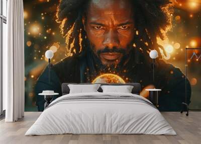 A man with dreadlocks holds a glowing orb in his hands, his eyes fixed on the orb. The background is blurred and filled with lights Wall mural