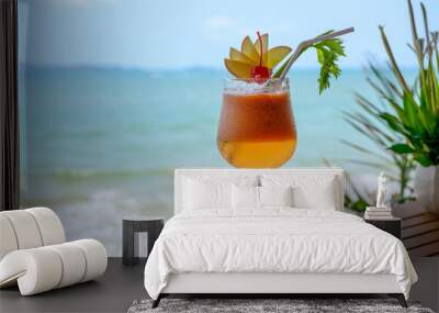 Apple mocktail with cherry in wine glass in tropical sea Wall mural