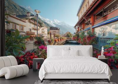 Chamonix Mont Blanc downtown among the French alps with flower blooming, canel and architechural classic building at Haute Savoie, France Wall mural