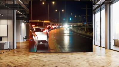 Traffic jams on the road at night in bangkok Wall mural