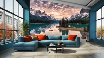 Traveler canoeing with rocky mountain reflection on Maligne lake at Spirit island in Jasper national park Wall mural