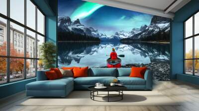 Traveler woman sitting on canoe with aurora borealis over Spirit Island in Maligne lake at Jasper national park Wall mural