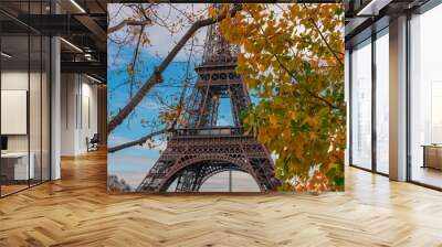 Eiffel tower with autumn leaves in Paris, France Wall mural