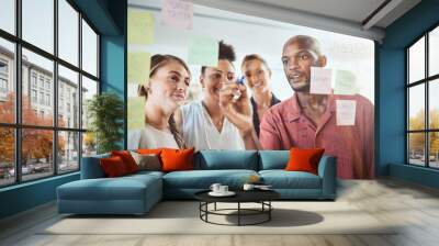 Business people planning, writing on glass board and brainstorming together for creative marketing idea, strategy or project. Teamwork, collaboration and manager in job management or work development Wall mural