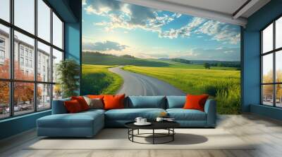 Beautiful summer rural natural landscape with fields young wheat, blue sky with clouds. Warm fresh morning and road stretching into distance. Panorama of spacious hilly area Wall mural