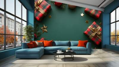 Christmas gift boxes on green background Wall mural