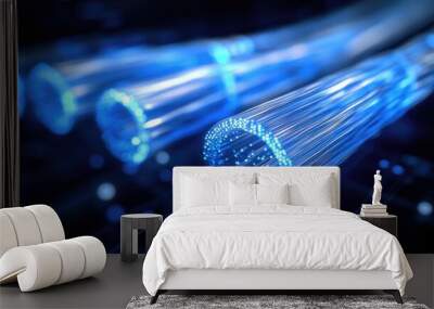 A close-up of glowing fiber optic cables, illustrating high-speed data transmission. Wall mural