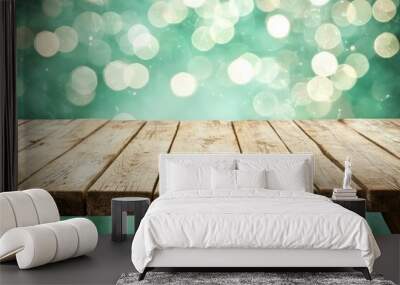 Wooden table set against a soft green bokeh backdrop, ideal for showcasing products or food photography. Wall mural