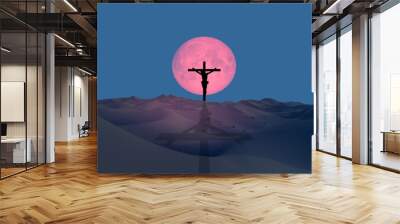 Jesus Christ on the cross over desert with full moon 