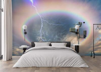 Weather station automatic measurement of weather parameters with lightning and rainbow Wall mural