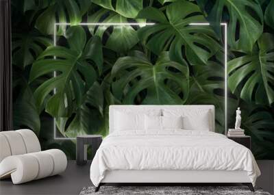 Minimal nature concept. Creative layout made of tropical leaves with white neon frame. Flat lay. Wall mural