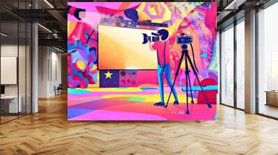 A man filming a scene with vibrant abstract background. Wall mural