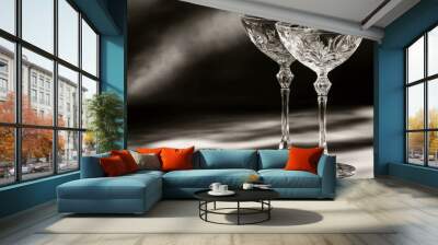 Two ornate crystal glasses on a table. Wall mural