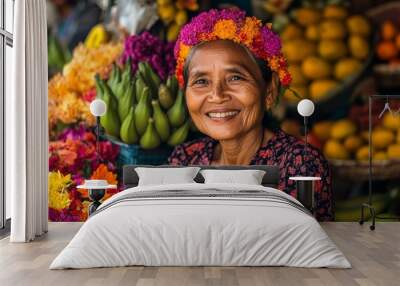 Woman with flower crown smiling amongst fruits and flowers. Wall mural