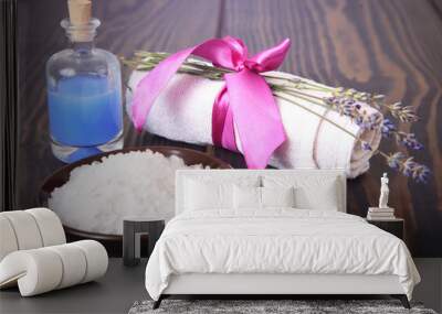 Lavender, salt on a wooden table, hygiene items for bath and spa. Wall mural