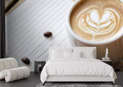 A close-up view of a perfectly crafted cappuccino in a pristine white ceramic cup and saucer. Wall mural