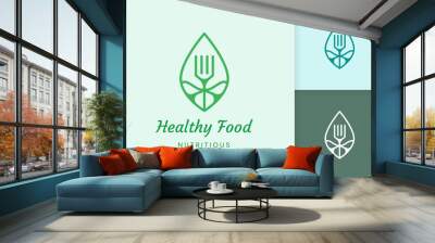 healthy food logo with fork and leaf shape Wall mural