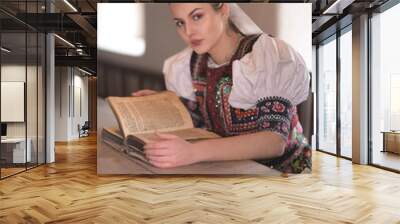 Beautiful slovak woman in traditional costume. Slovak folklore. Wall mural