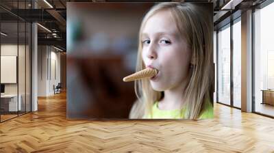 Pretty baby girl kid eating licking big ice cream Wall mural