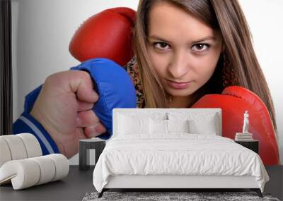 Young beautiful woman during fitness time and boxing Wall mural